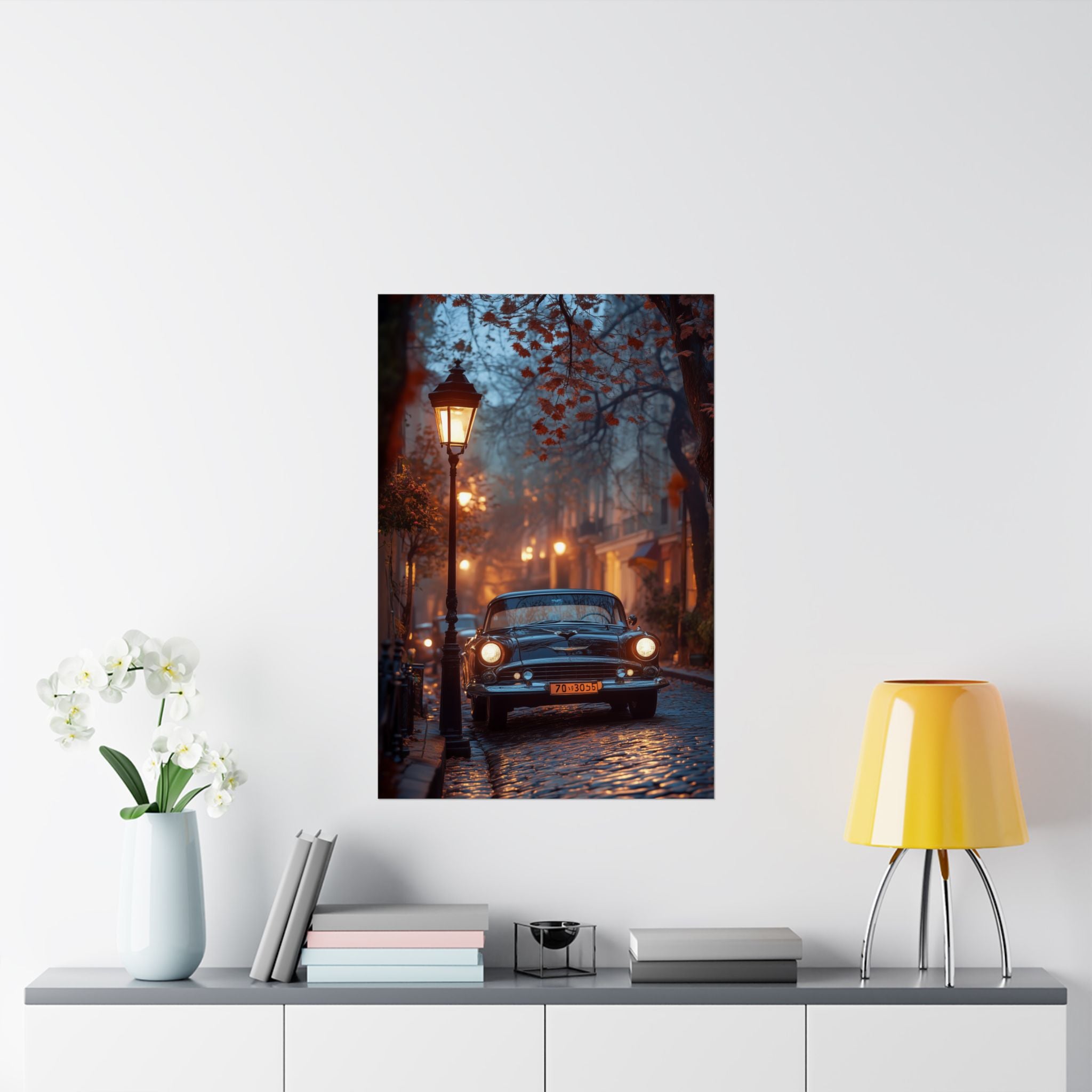 Vintage car parked on cobblestone street under autumn lanterns | Retro vibes classic car photo